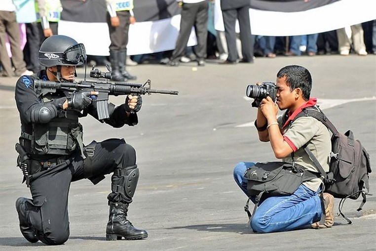 Crazy photographers who will do ANYTHING for the perfect shot